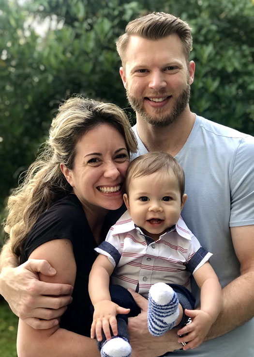 Jesse Walker with his wife and son